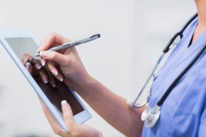 Nurse with ipad