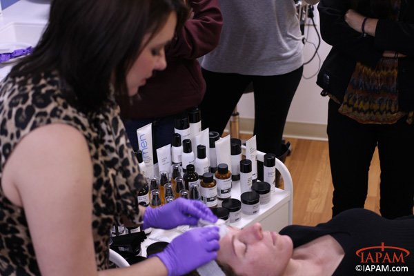 female patient receiving a chemical peel during training