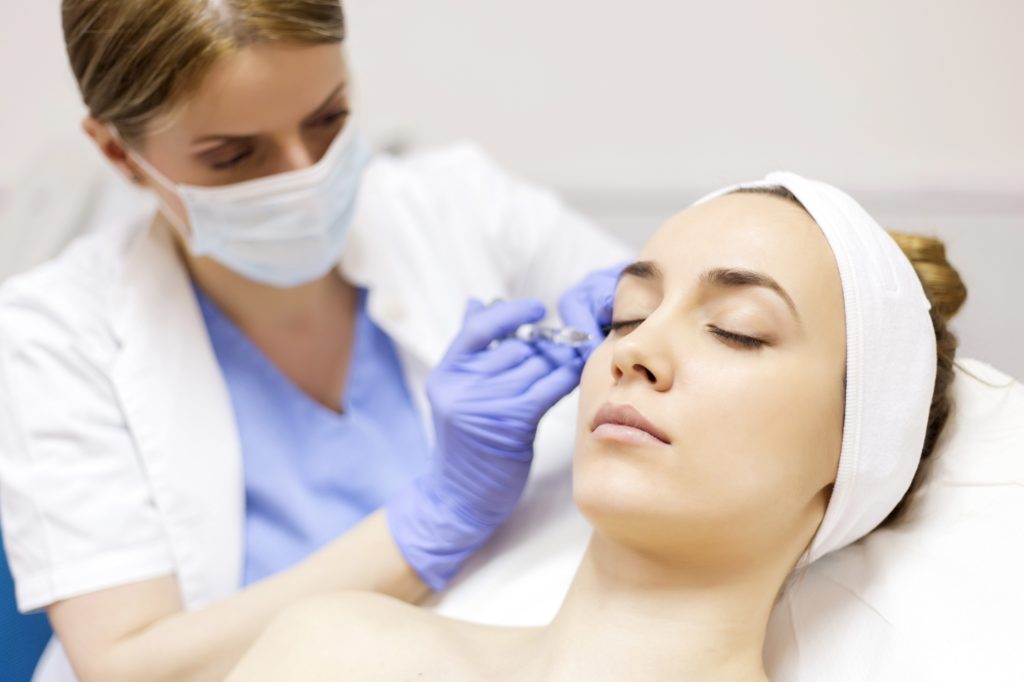 Female patient getting upper face botox injection