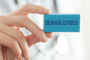 Doctor holding a sign that says semaglutides