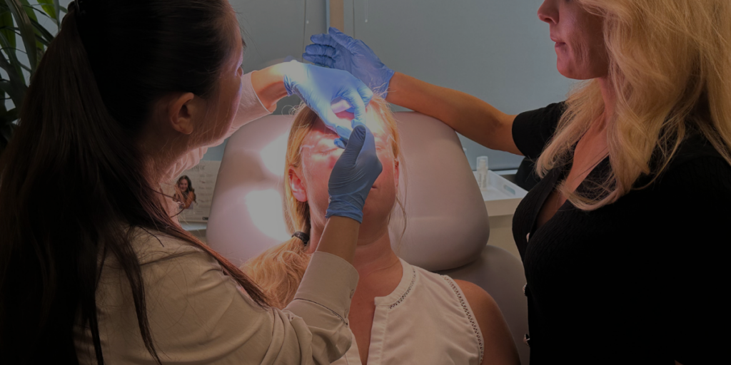 Woman receives Botox® at the IAPAM's Aesthetic Medicine Symposium