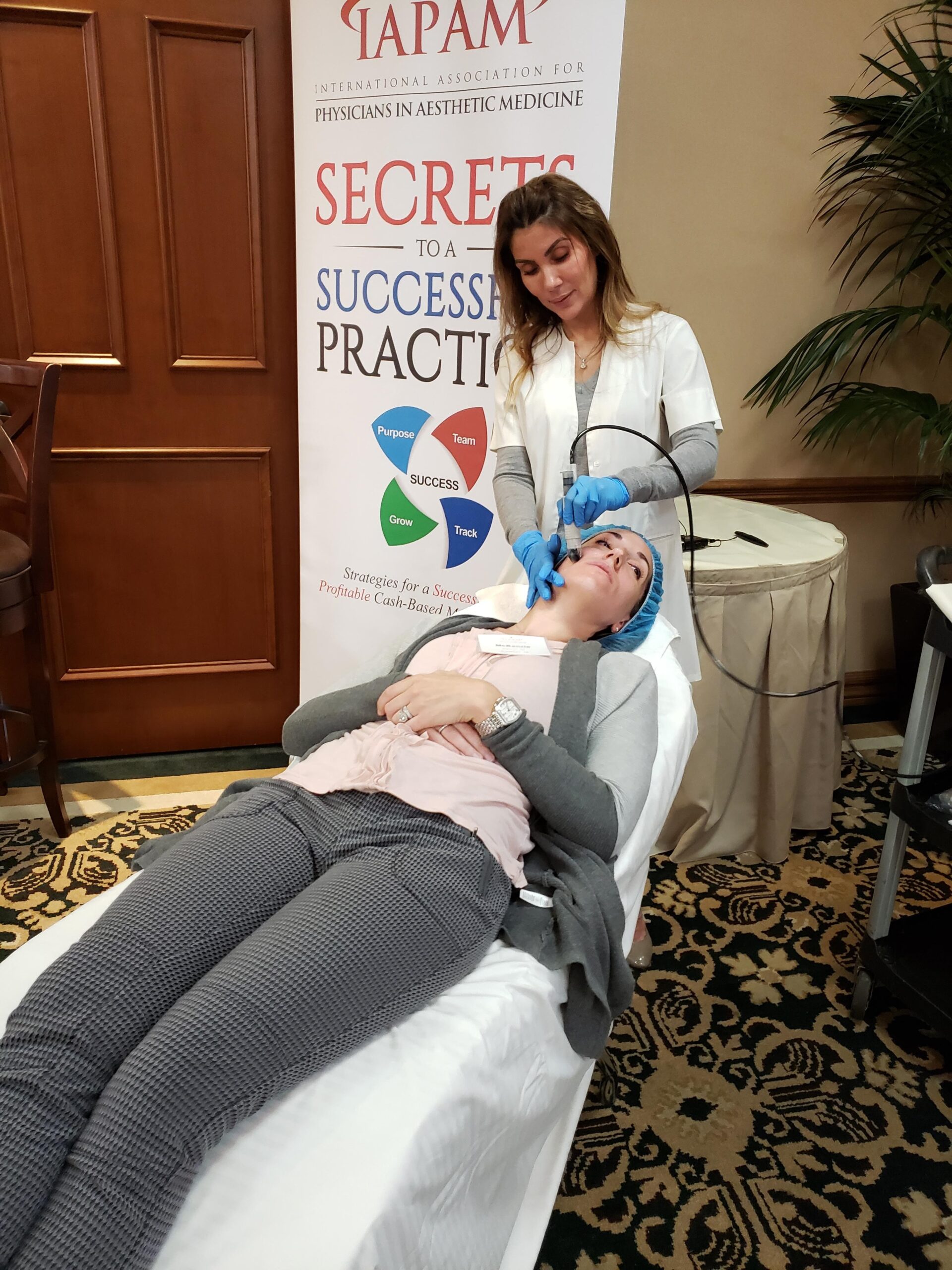 Image a microneedling procedure at IAPAM's Aesthetic Medicine Symposium.