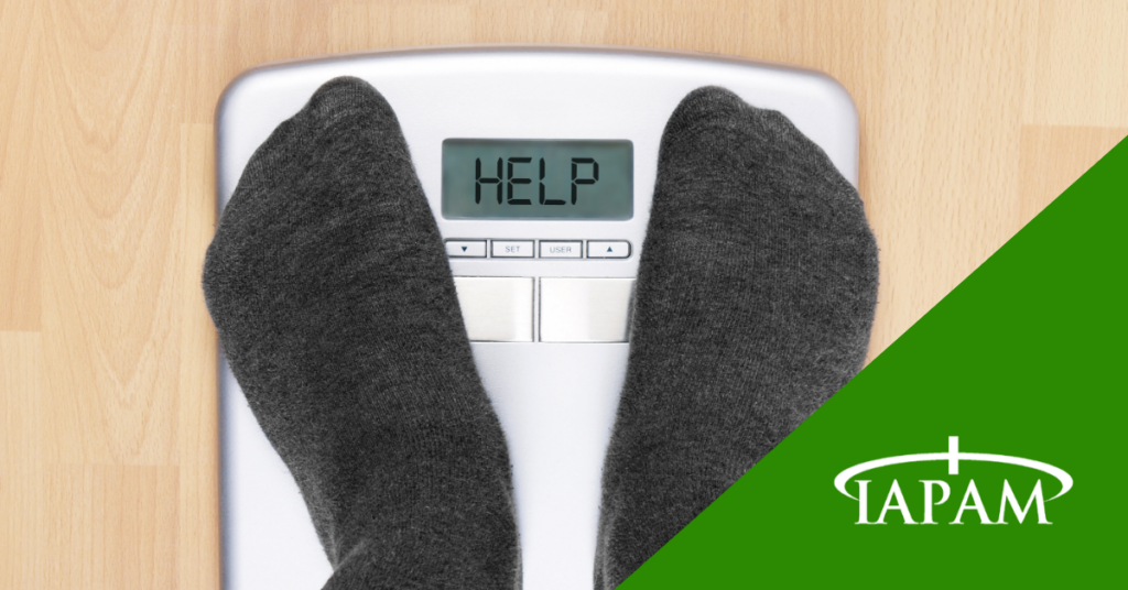 Feet standing on weight scale
